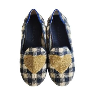 Rothy's Blue and White Slippers with Decorative Design